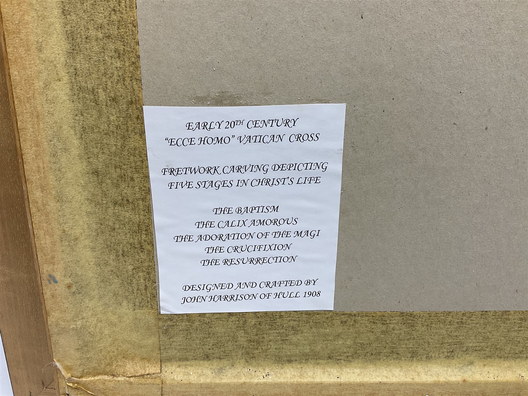 Cork carving of a religious cross depicting intricate scenes of various religious figures and motifs amongst trees and foliage, with central circular panel of Jesus Christ, in glazed frame, H95cm