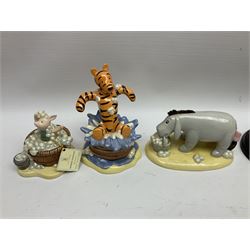 Nine Royal Doulton Winnie the Pooh Collection figures, including Oh Dear Bath Time's Here, Going Sledging, Tigger's Splash Time and Christopher Robin, together with a Royal Doulton Disney Showcase Jiminy Cricket figure, all boxed