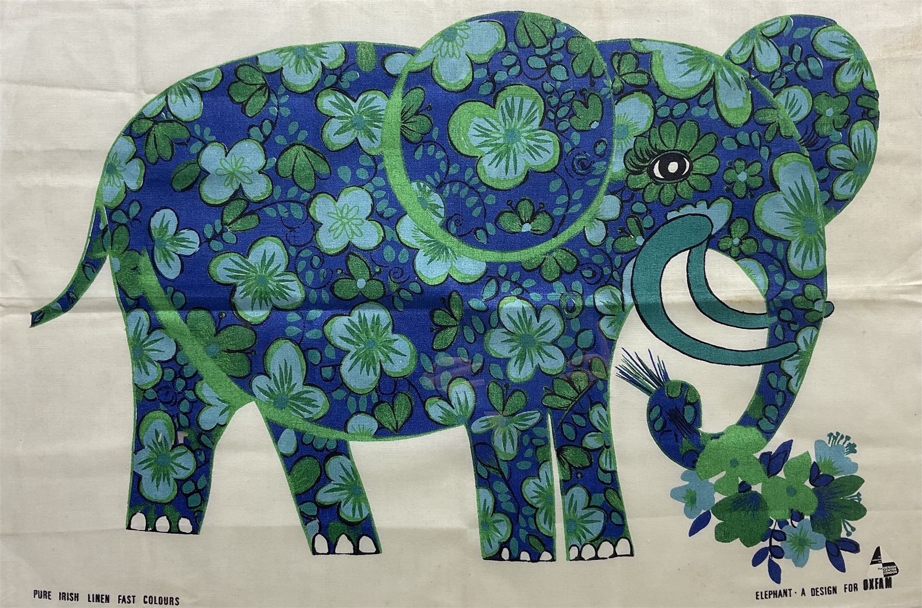 Belinda Lyon (British 20th Century) for Oxfam: 'Elephant', framed tea towel 54cm x 78cm 
