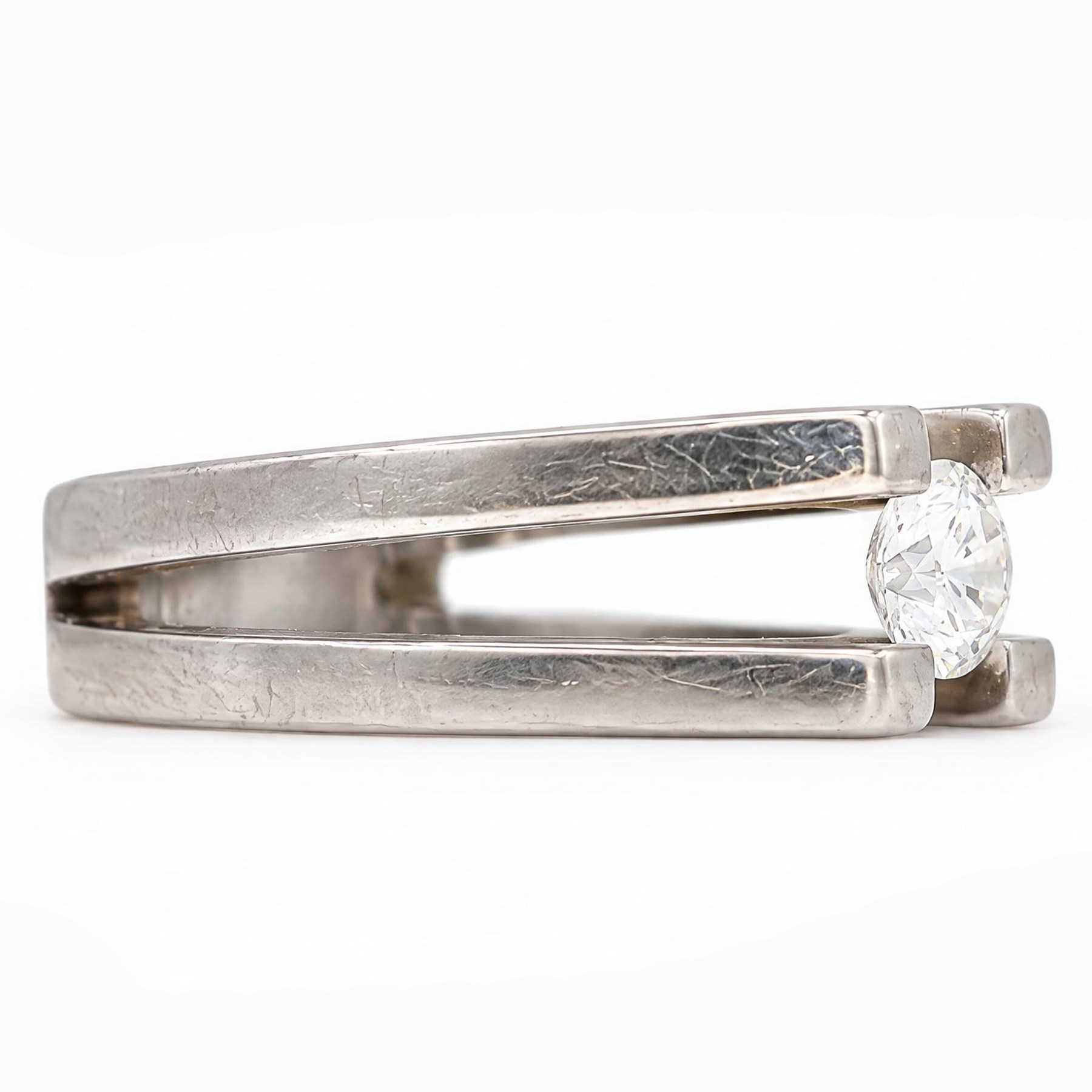 Titanium diamond ring, four claw set with a single round brilliant cut diamond of approx 0.45 carat