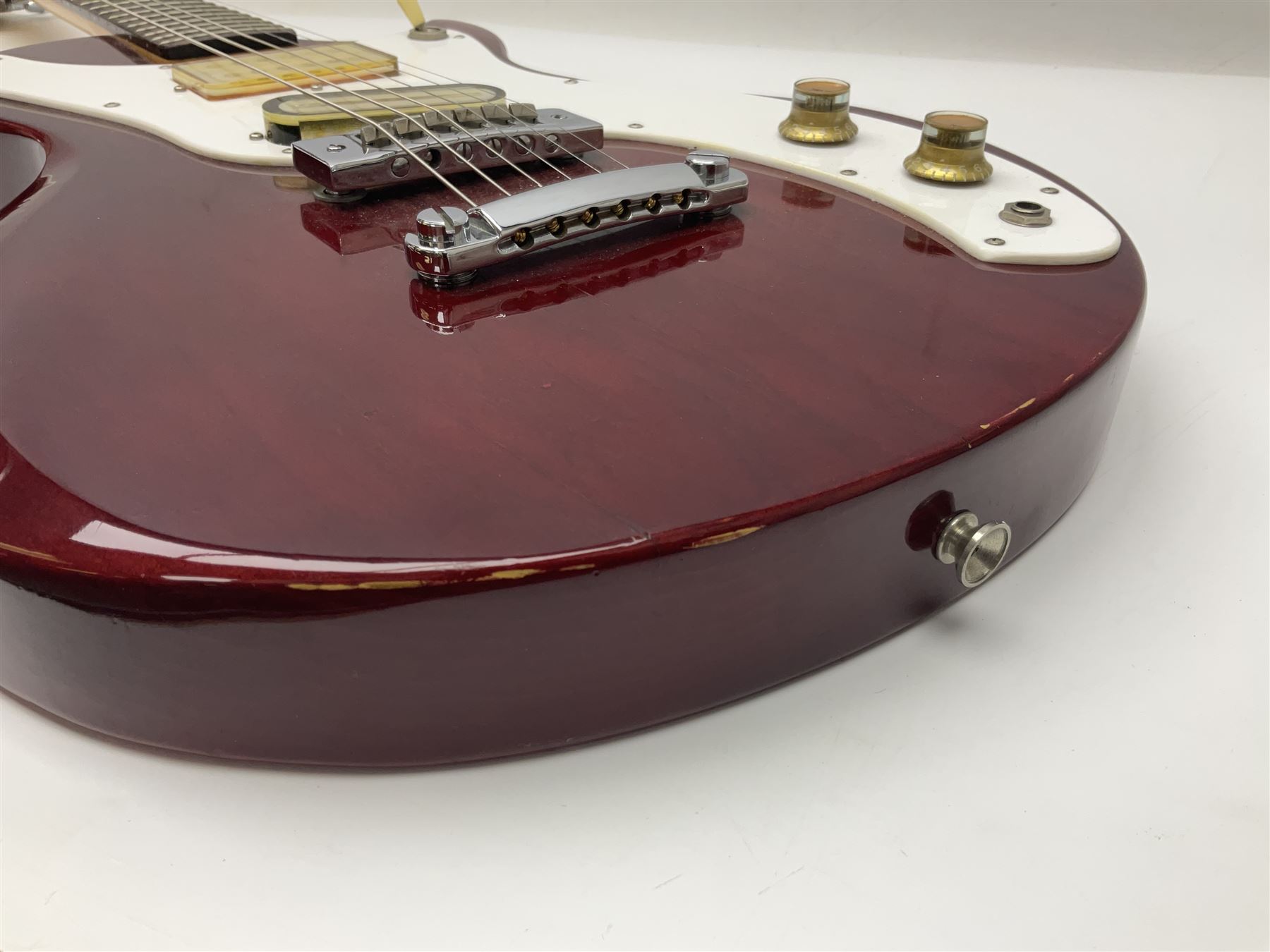 Gibson Marauder style six-string electric guitar with cherry coloured body, marked made in Japan L101cm; in locking hard carrying case