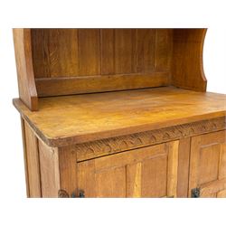 Gnomeman - adzed oak dresser, arcade carved cresting rail over two lead glazed doors, double cupboard below enclosed by two panelled doors, carved with gnome signature, by Thomas Whittaker, Little Beck 
