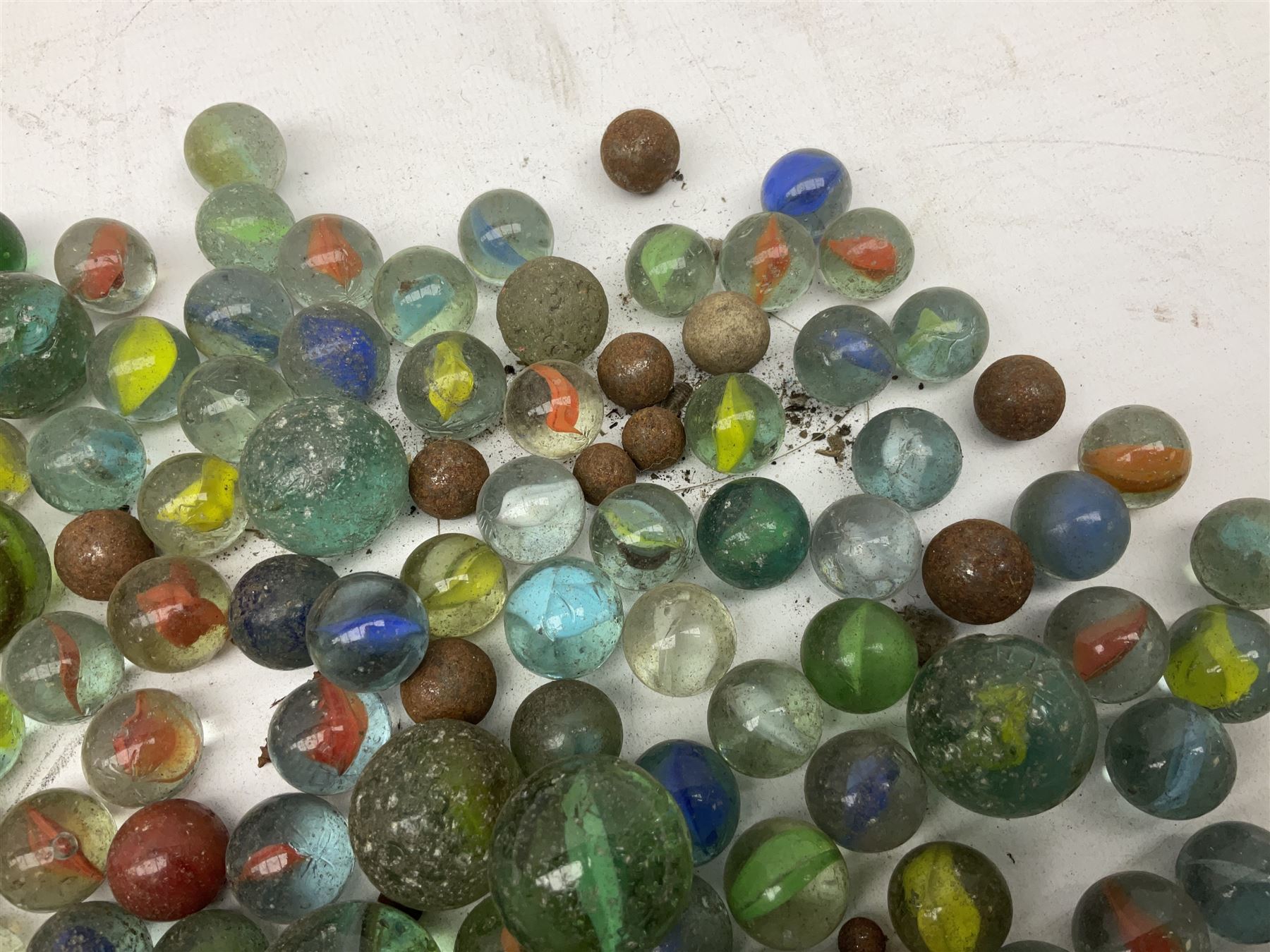 Collection of marbles with multi-coloured latticino or onionskin decoration