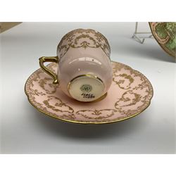  Royal Crown Derby tea trio, decorated with green, pink and gilt design with floral detail, together with Royal Doulton coffee can and saucers, both with printed mark beneath