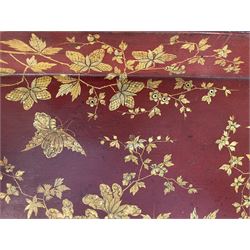 Early 19th century red lacquered papier-mâché tray by Clay of King Street Covent Garden, of rounded rectangular form, painted in gilt with large foliate sprays and butterflies, impressed verso CLAY KING ST COVENT GARDEN, W66.5cm D48.5cm