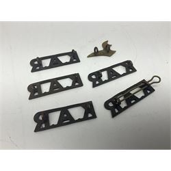 Over thirty British and Continental military metal badges; together with quantity of shoulder titles, collar dogs, rank pips, uniform buttons etc