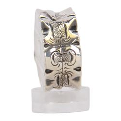 Victorian silver vinaigrette, of oval form with shaped edge, decorated throughout with engine turned bands, the hinged cover with vacant C scroll panel opening to reveal a foliate pierced grille and gilt interior, hallmarked George Unite, Birmingham 1857, L3.5cm