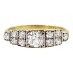 Art Deco gold milgrain set old cut diamond ring, the central diamond of approx 0.50 carat, set with five diamonds either side, stamped 18ct Plat