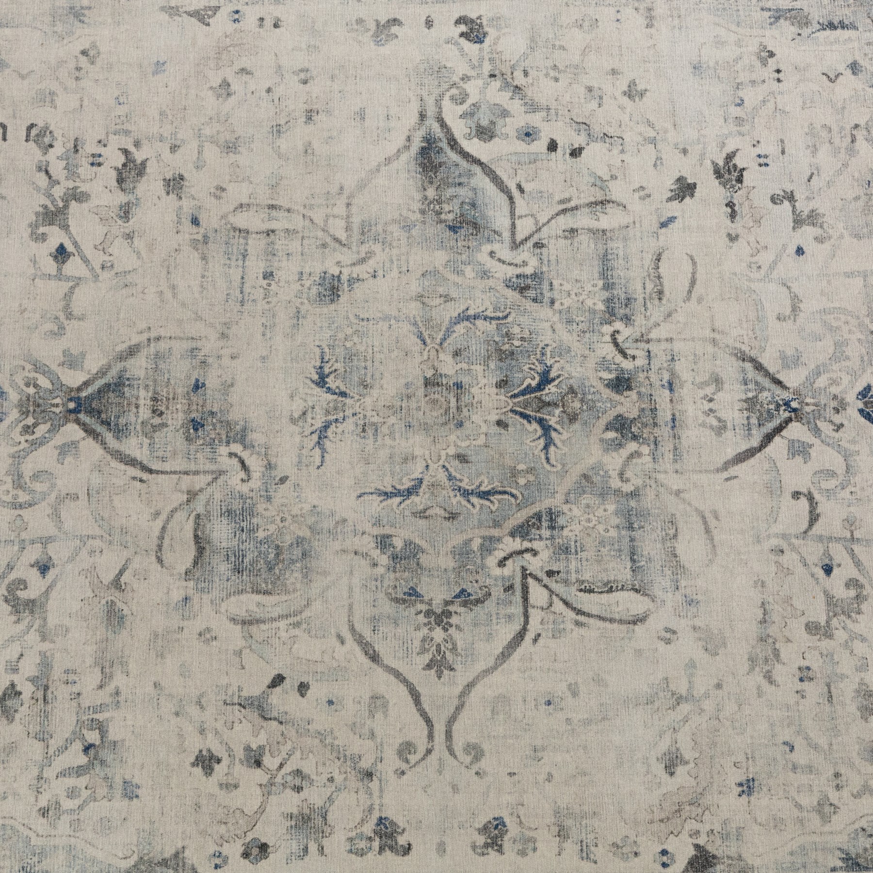 Ruggable - ‘Sarrah’ blue quartz flatwoven washable rug, ivory ground with blue and grey floral medallion, scrolling foliage and patterned borders, with a distressed effect finish, two-piece construction comprising a removable cover and separate pad, with a water-resistant and stain-resistant polyester barrier