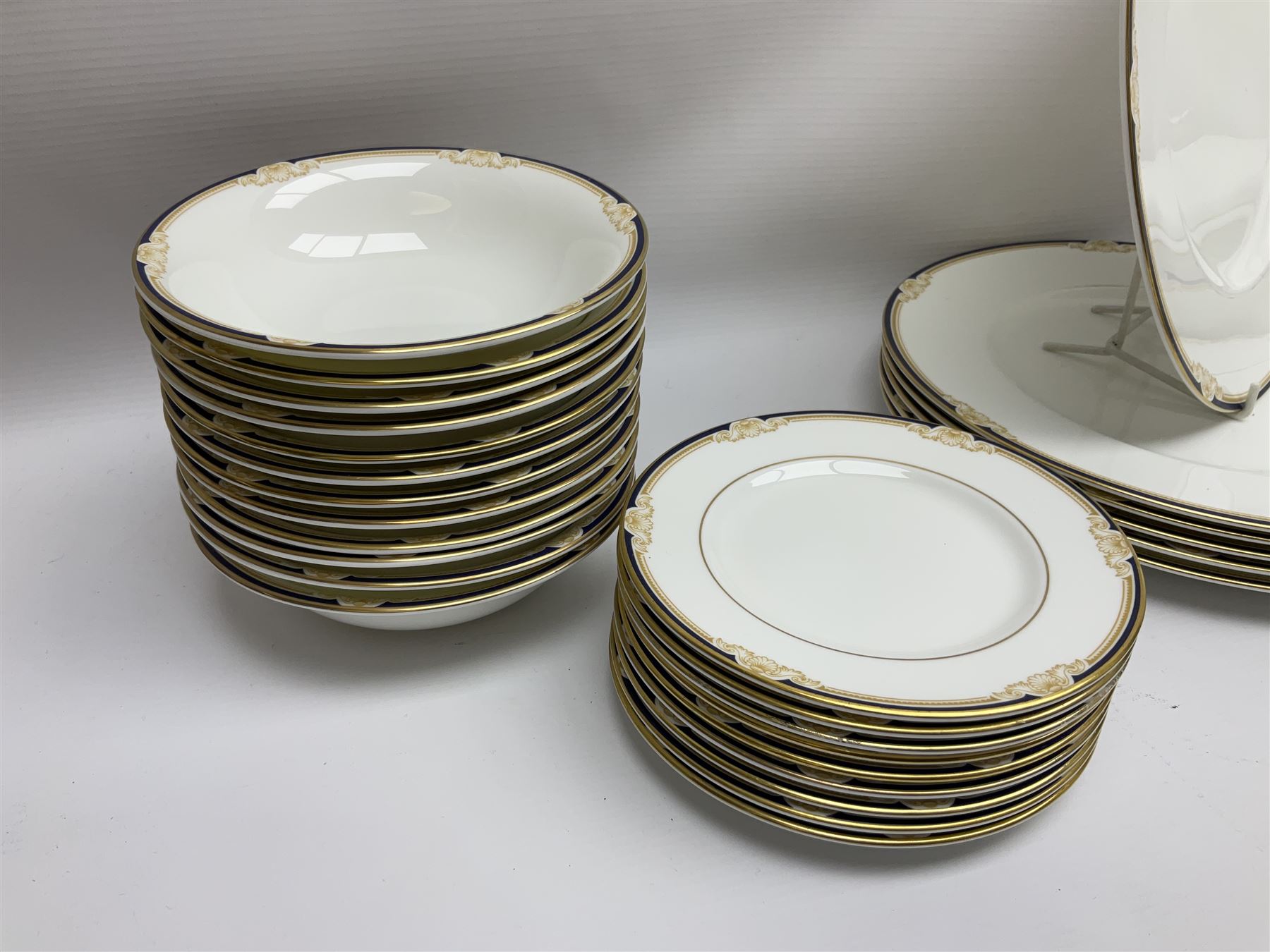 Wedgwood Cavendish pattern dinner service for twelve, comprising dinner plates, side plates, bowls, soup bowls, two tureens, saucer boat and sauce, together with matching part coffee service (82) 
