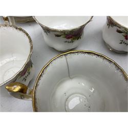 Royal Albert Old Country Roses pattern part tea service, comprising eleven saucers, four teacups,
pair of cake plates, six side plates, six dessert plates, two jugs and teapot