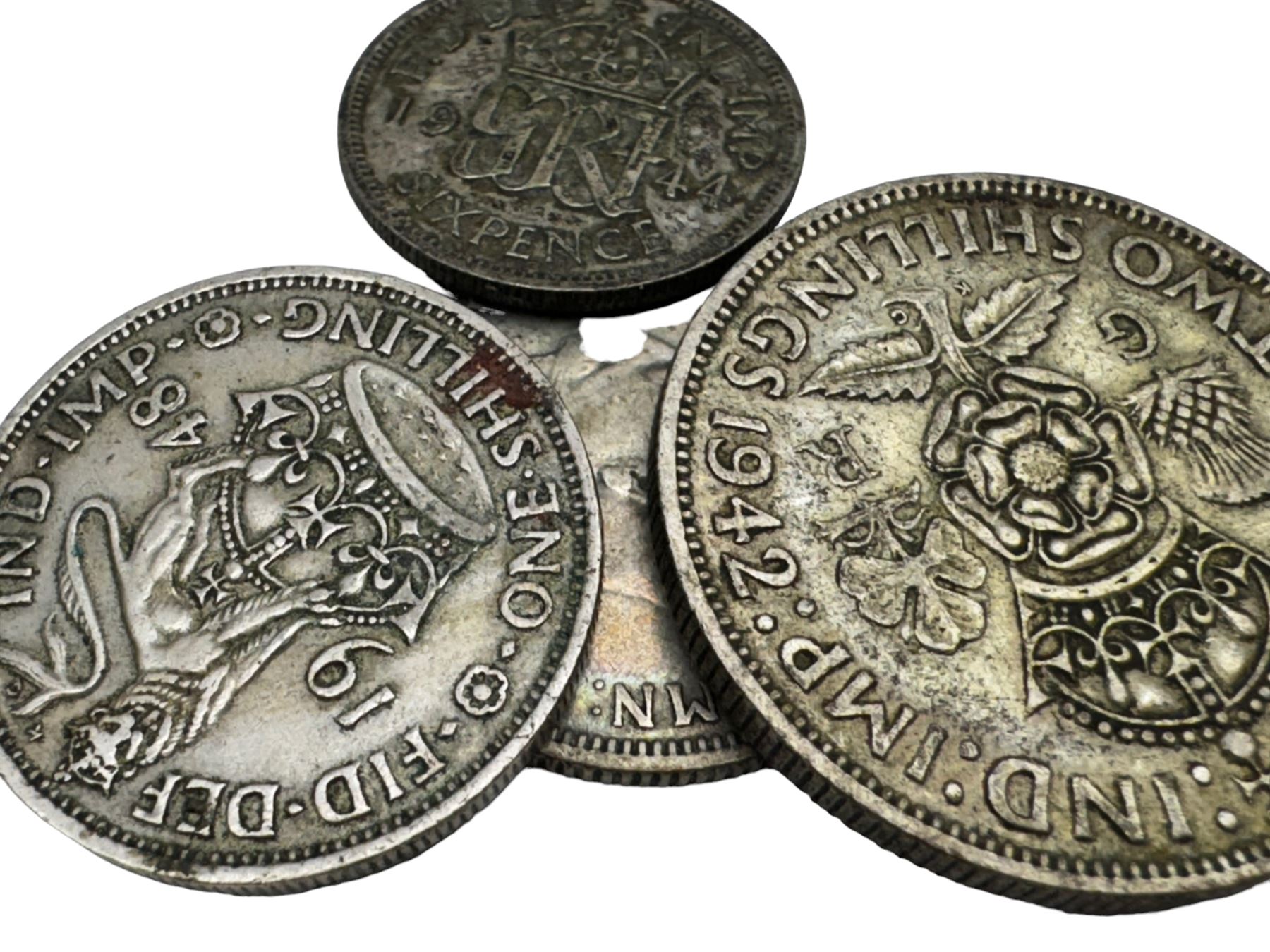 Coins including Elizabeth I 1573 sixpence and other hammered silver coins, commemorative fifty pence pieces with 2003 'Give Women The Vote', 2017 'Benjamin Bunny', 2017 'The Tales of Peter Rabbit', 2019 'Sherlock Holmes', small quantity of Great British pre 1947 silver coins, commemorative crowns, spade guinea style gaming tokens etc