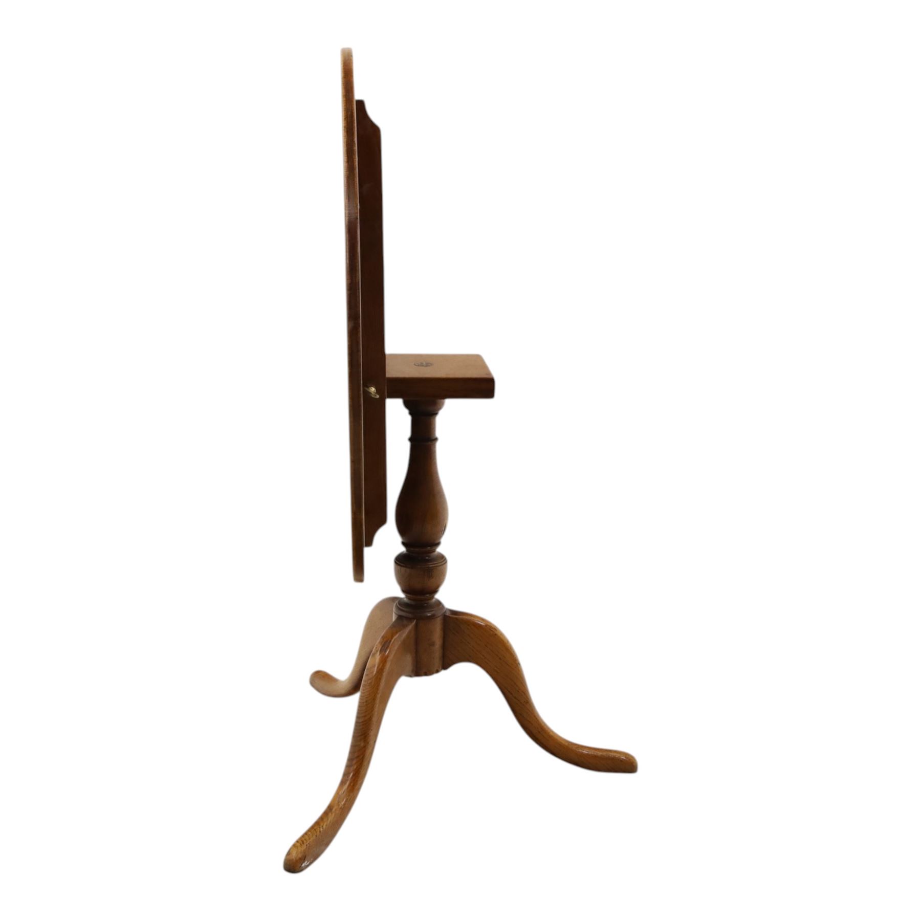 Traditional design golden oak tilt-top tripod table, brass fittings, turned baluster column on splayed supports