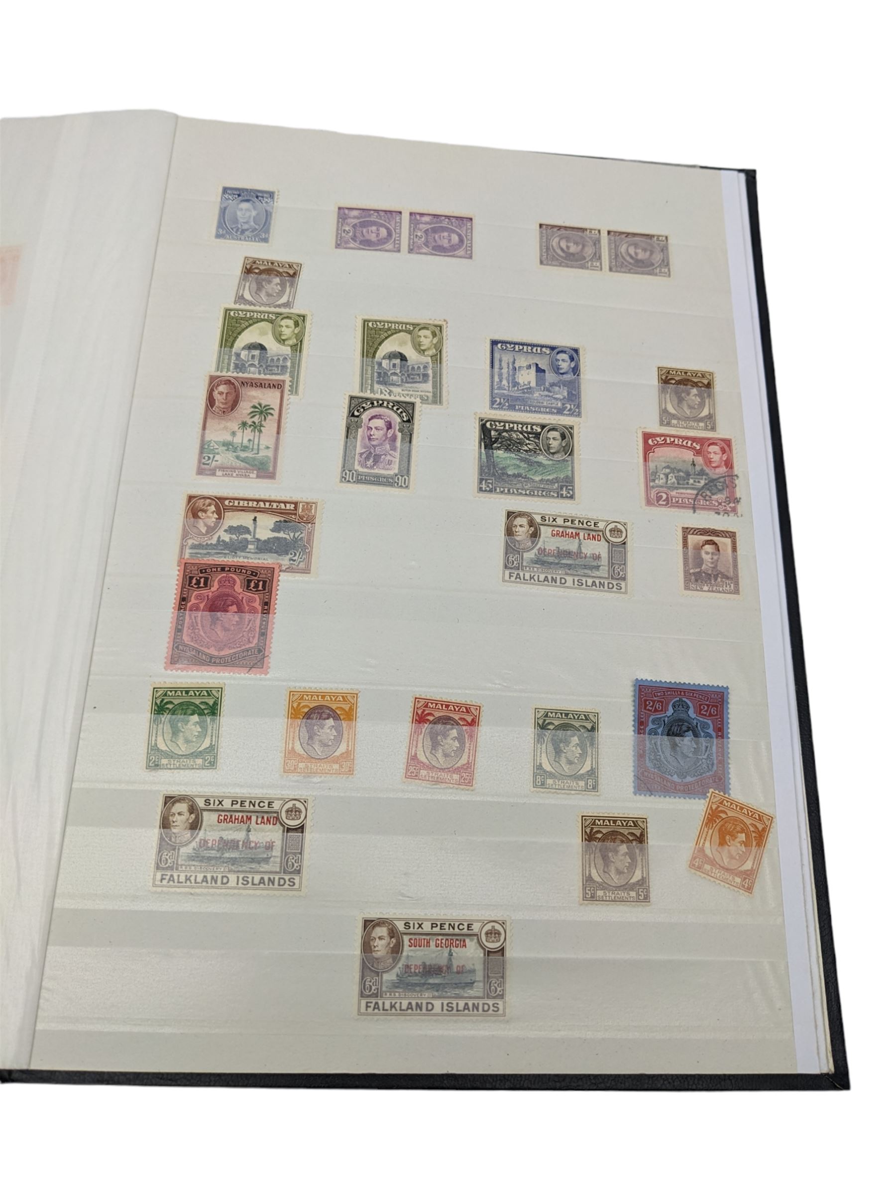 World Stamps including Seychelles, Southern Rhodesia, Sudan, Cyprus, Bermuda, Queen Victoria Canada, King Edward VII Straits Settlements etc, mixture of mint and used values, housed in a black stockbook