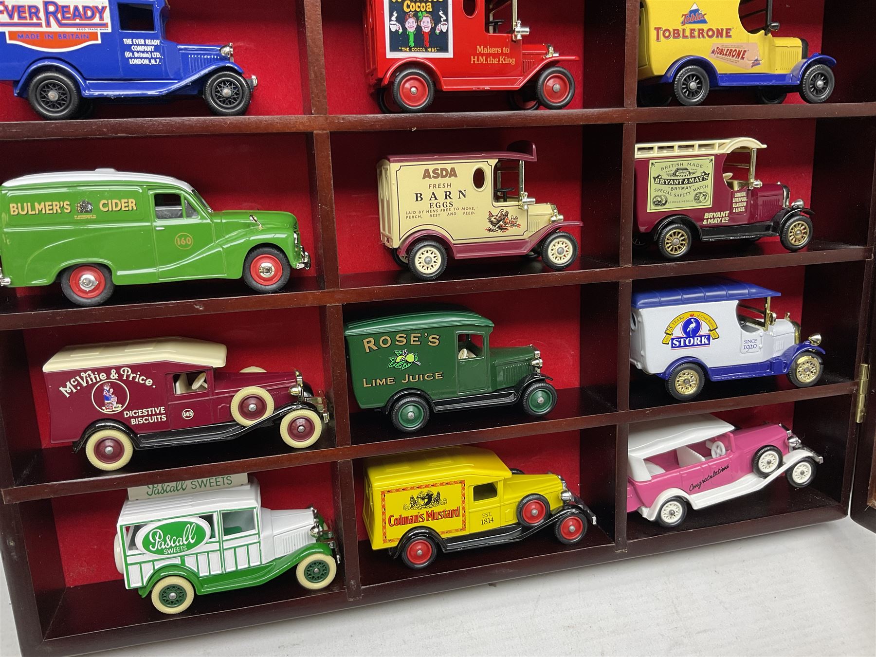 Collection of die-cast vehicles to include Corgi, Dinky, Lledo and Days Gone, housed in six wood display units