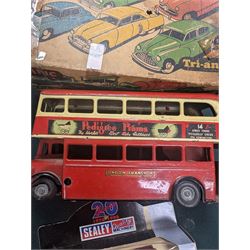 Small collection of model vehicles, including tin-plate trolley bus, Dinky Guy lorry, Triang Pedigree Prams bus, etc