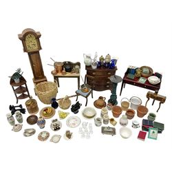 Collection of miniature dolls house furniture and accessories, to include long case clock, chest of drawers, tiled wash stand, ceramics and glass ware, mirror, baskets, etc 