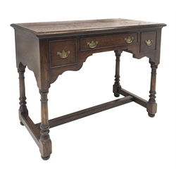 Bylaws Furniture - traditional oak desk dressing table fitted with three drawers, turned supports connect by H shaped moulded stretchers, W107cm, H77cm, D50cm