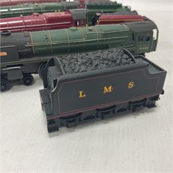 Hornby ‘00’ gauge - four steam locomotives comprising Britannia Class ‘Britannia’ 4-6-2 no.70000 in BR green; Britannia Class ‘Oliver Cromwell’ 4-6-2 no.70013 in BR green; Princess Class 4-6-2 no.6201 in LMS crimson; Coronation Class ‘Duchess of Sutherland’ 4-6-2 no.6233 in LMS crimson; one further tender (5) 