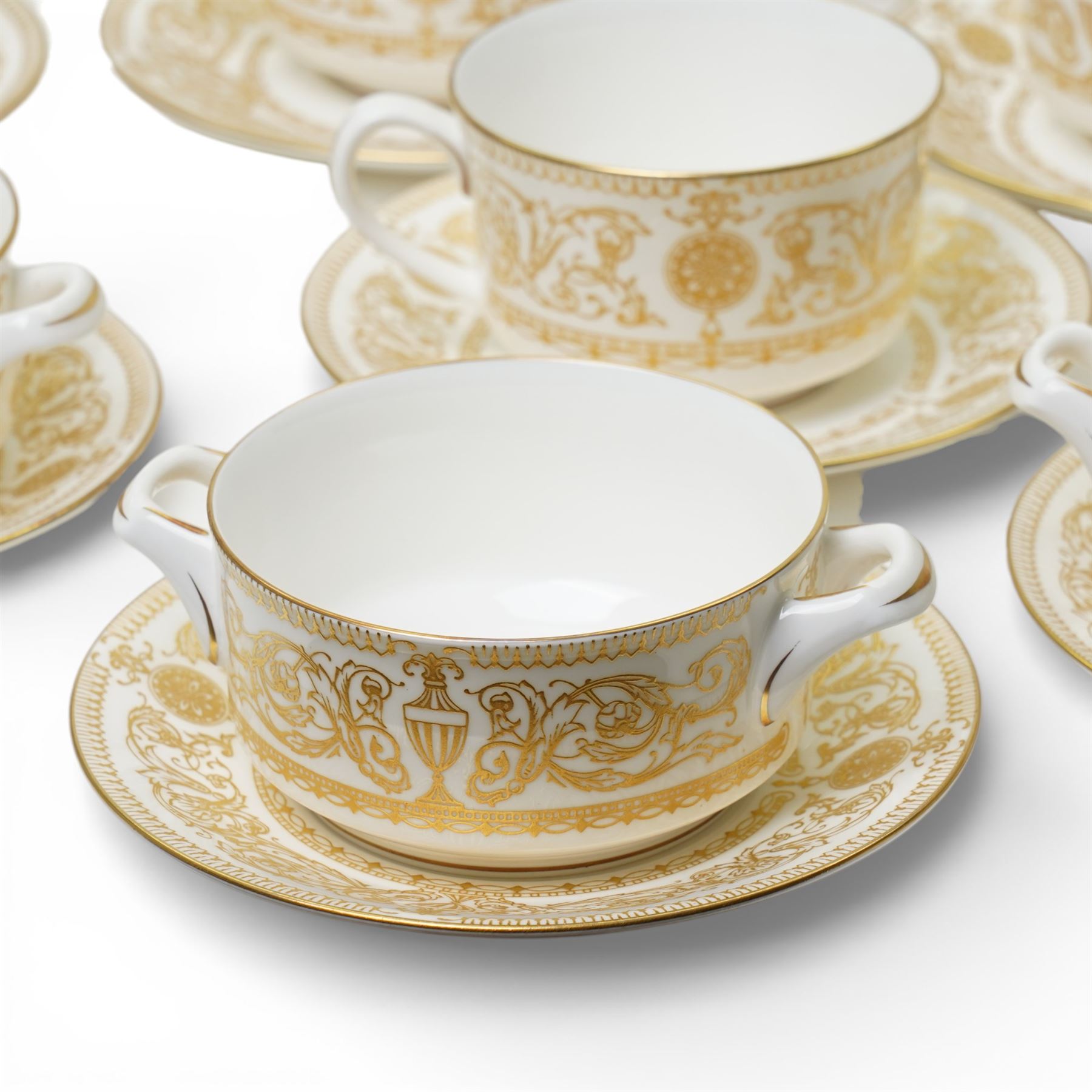 Royal Worcester Hyde Park tea and dinner wares, comprising nine dinner plates, nine smaller dinner plates, thirteen side plates, nine soup bowls and saucers, eleven teacups, eleven saucers, sauceboat and saucer, four covered tureens and one platter