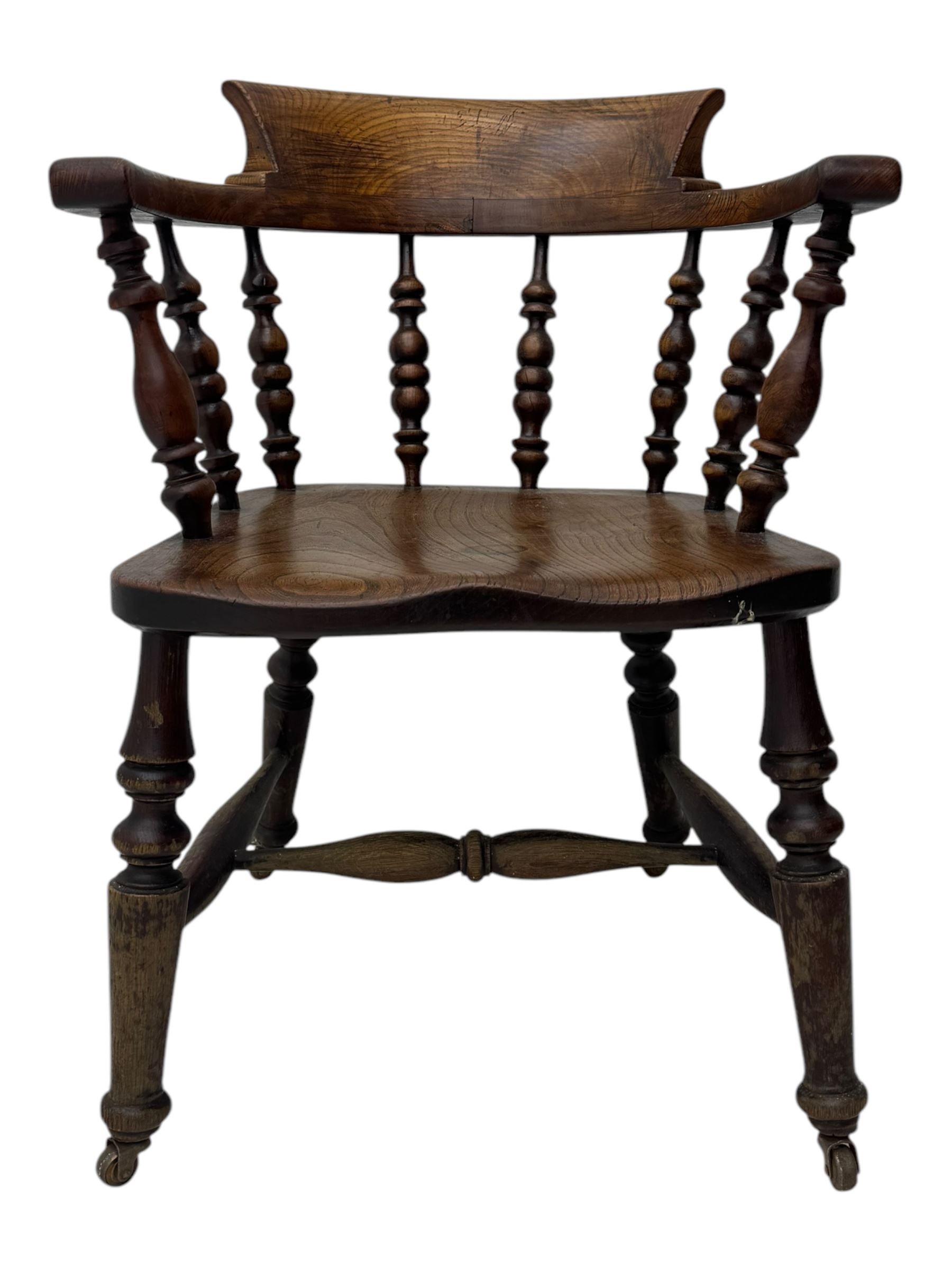 Victorian elm captains smokers bow chair, spindle turned tub shaped back, saddle seat, seat height 41cm