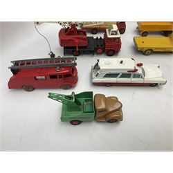 Dinky - eight unboxed and playworn/repainted commercial vehicles including Foden flatbed lorry, Bedford Articulated lorry, Leyland Comet Ferrocrete lorry, Guy Spratts panel van, Fire Engine, Jones Fleetmaster, Commer breakdown truck etc (8)
