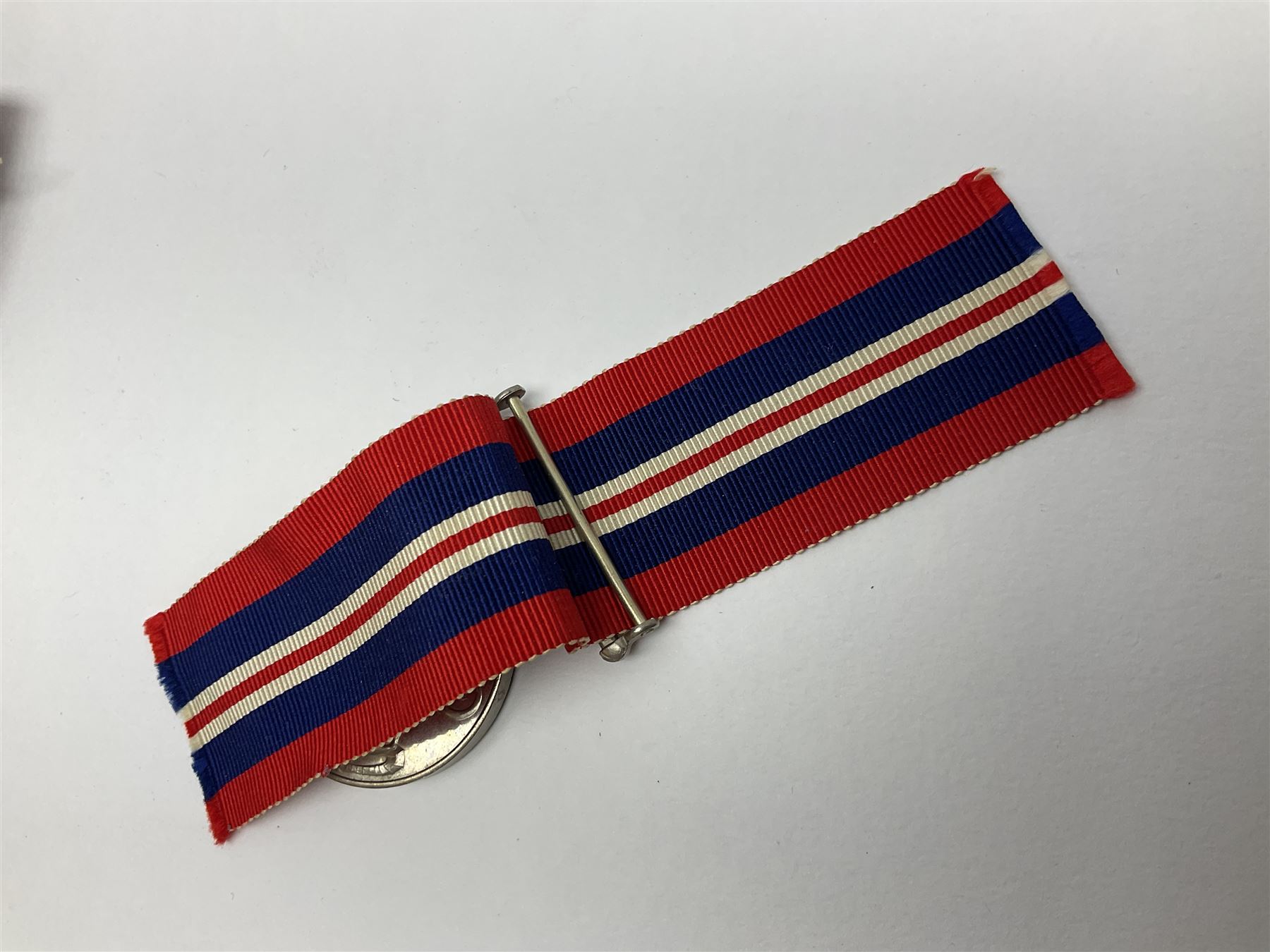 WW1 group of three medals comprising British War Medal, Victory Medal and 1914 Star awarded to 8328 Pte. G. Shaw Yorks: L.I.; on hanging bar with WW2 1939-1945 War Medal and WW1 ribbon bar with rosette to 1914 Star ; all with ribbons; and WW2 1939-1945 War Medal with ribbon