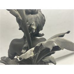 Pair of Art Nouveau style spelter figural table lamps, each mounted on rouge marble effect circular bases, with toleware flower heads and leafy decoration surrounding a female figure, H90cm