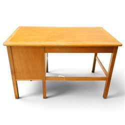 Abbess Woodwork Company - Mid  20th century solid oak single pedestal desk, rounded rectangular top with single pedestal, oak pull handles with fitted slide, above a drawer with cutlery divider, over a double height drawer, square tapering supports united by stretchers