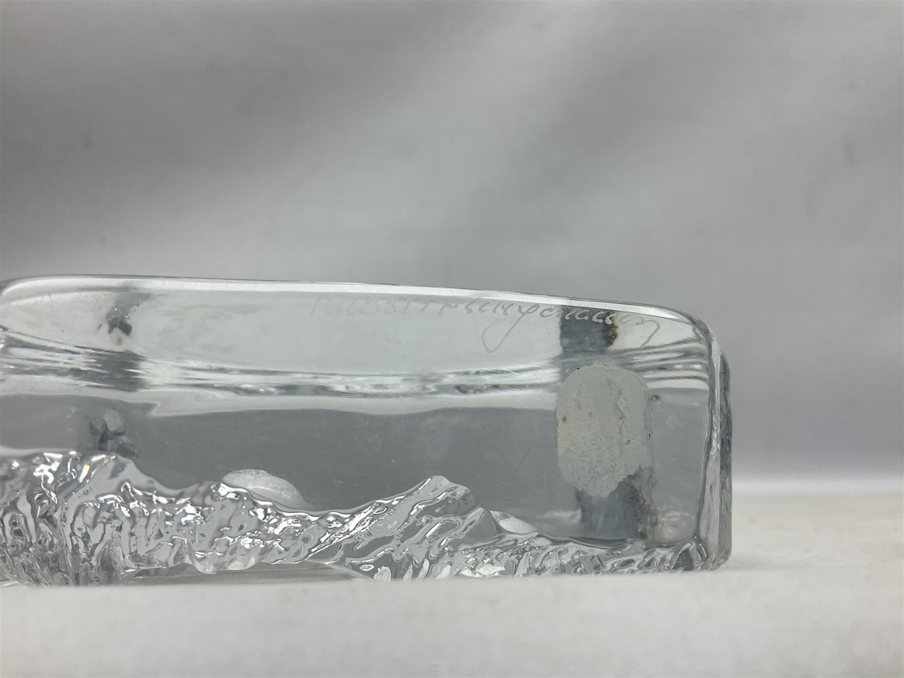 Two Mats Jonasson, Sweden paperweights, comprising polar bear in ice cave no 3152 and lion cubs, both with etched marks beneath, tallest H11.5cm