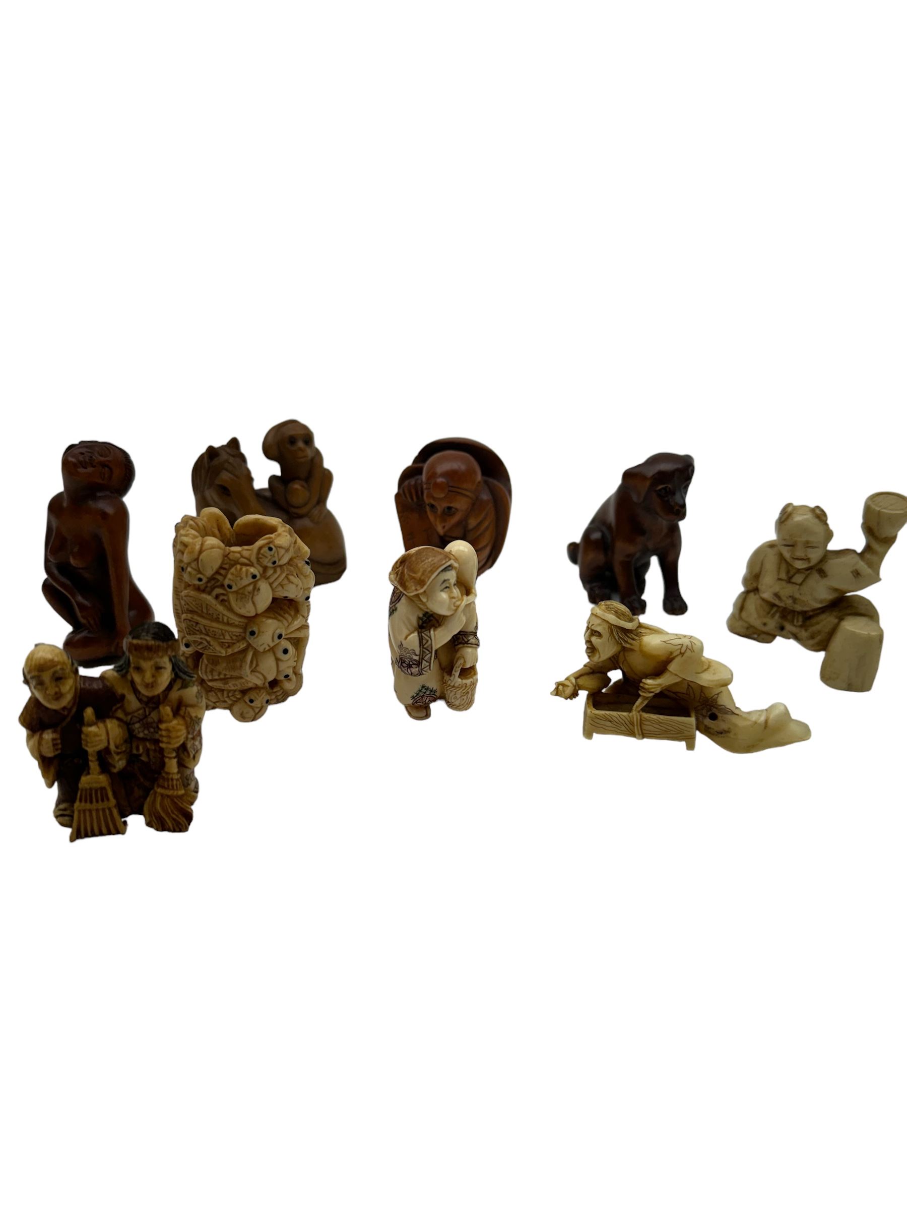 Nine wooden and composite carved netsukes, to include dog, horse and monkey, female figure etc 