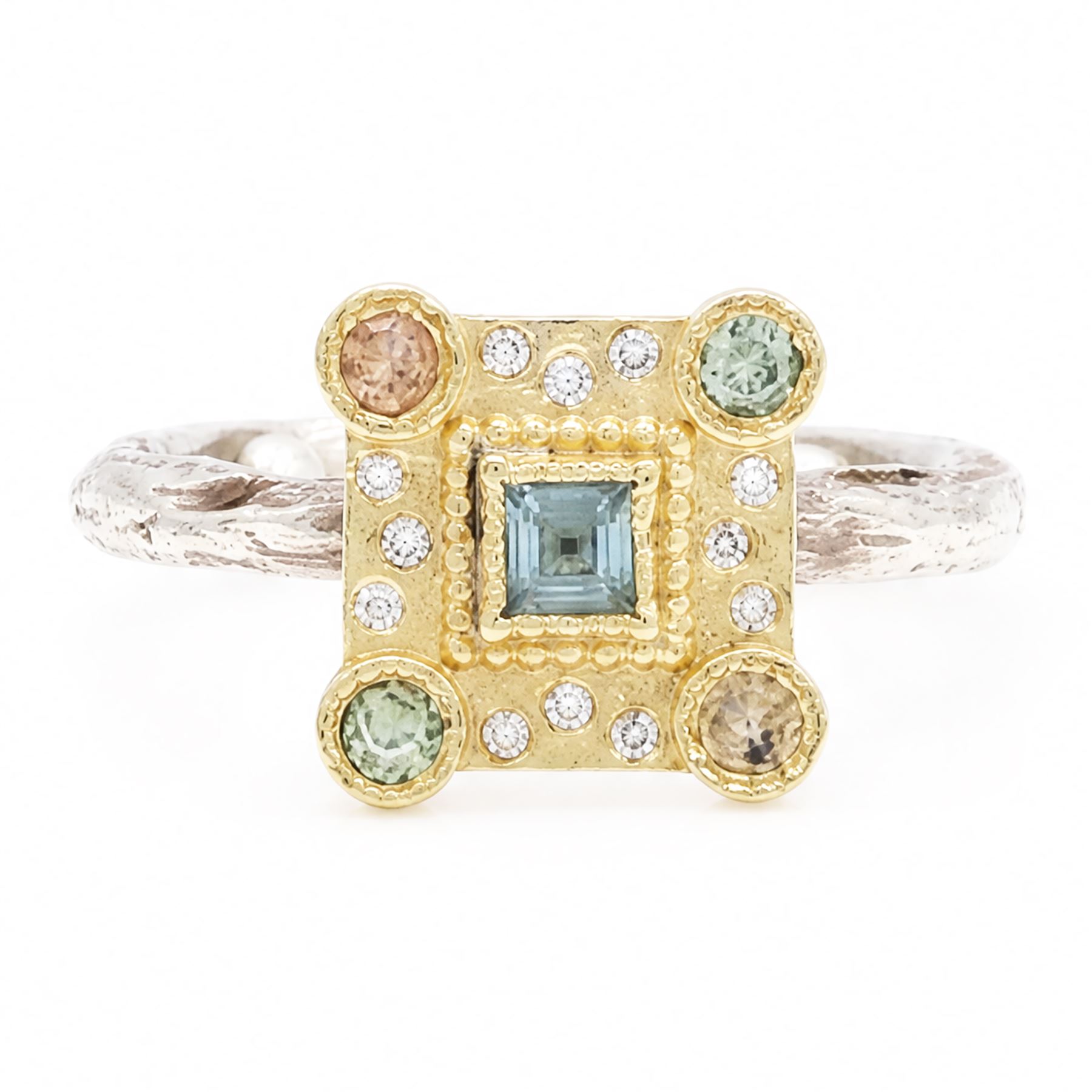 18ct gold and silver blue topaz, sapphire diamond dress ring, square cut blue topaz, surrounded by round brilliant cut diamonds, the corners set with green and orange / brown sapphires,stamped 18K 925