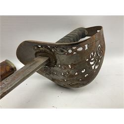 George V 1897 pattern Infantry officers sword, the 82cm single fullered blade with traces of etched detail and George V crown cipher, the ricasso marked Hawksworth Sheffield, pierced half basket hilt with George V cypher, wire-bound fish-skin grip with brass pommel and backstrap; in leather scabbard L102cm overall; together with two sectional gun cleaning rods; swagger stick made of leather strips etc