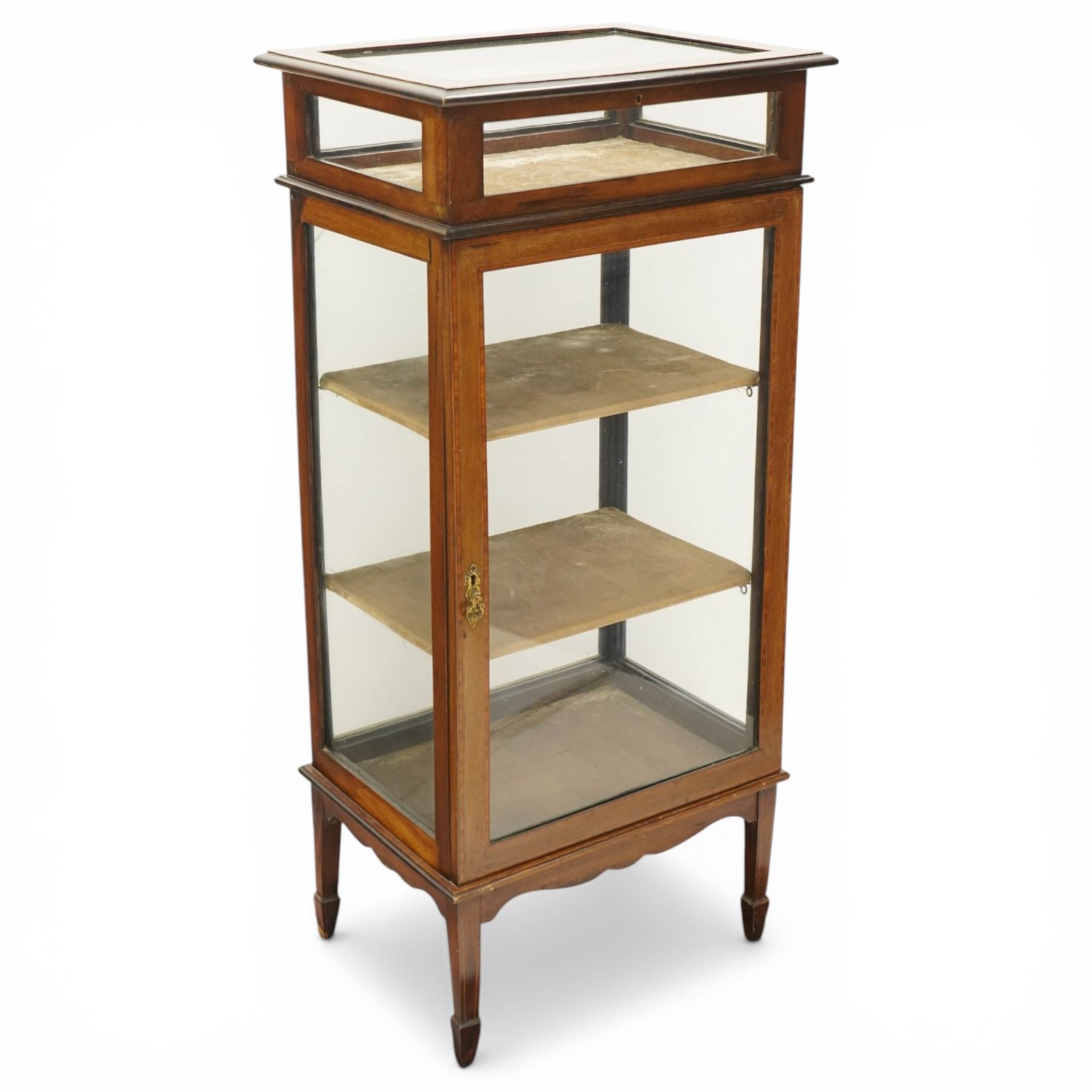 Edwardian inlaid mahogany glass cabinet with bijouterie upper section, four tier design with velvet lined interior shaped apron raised on spade feet