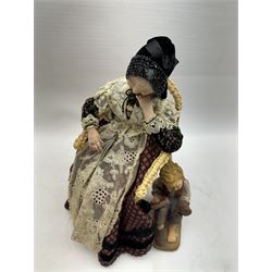 Anna Meszaros (Hungarian 1905-1998): 'My Great Granny', handmade needlework figurine, together with small plaster cast of a young boy by the same artist, granny H30cm
Auctioneer's Note: Anna Meszaros came to England from her native Hungary in 1959 to marry an English businessman she met while demonstrating her art at the 1958 Brussels Exhibition. Shortly before she left for England she was awarded the title of Folk Artist Master by the Hungarian Government. Anna was a gifted painter of mainly portraits and sculptress before starting to make her figurines which are completely hand made and unique, each with a character and expression of its own. The hands, feet and face are sculptured by layering the material and pulling the features into place with needle and thread. She died in Hull in 1998