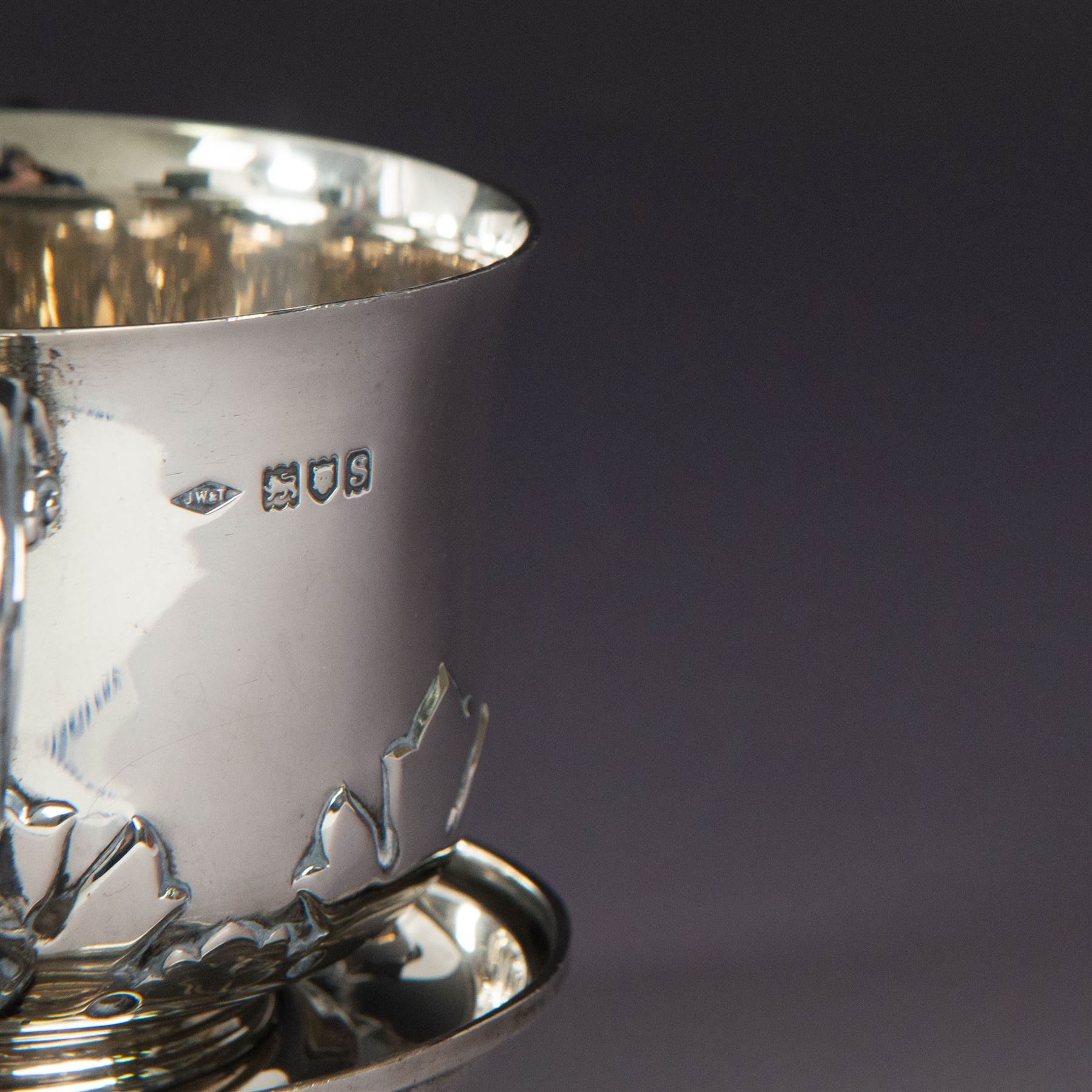Early 20th century silver porringer, decorated in relief with foliate decoration and later engraving to body, upon a stepped circular foot, with matching cover/stand, both hallmarked Johnson, Walker & Tolhurst, London 1913, H8cm