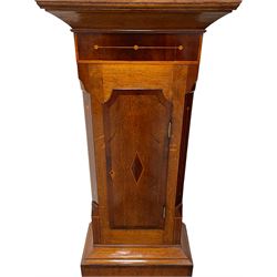 Musson of Louth - mid-19th century oak and mahogany 8-day longcase clock, with a swan’s neck pediment and ball and spire brass finial, break arch hood door flanked by reeded pilasters with brass capitals, canted angled trunk, flat topped door with concave corners, rectangular plinth on bracket feet, fully painted break arch dial with Roman numerals and minute track, subsidiary seconds dial and calendar aperture, matching stamped brass hands, eight day rack striking movement with anchor escapement. With weights and pendulum.
H206 W44 D23
Balthazar Musson from Baden (Germany) is recorded as working in Louth from 1835, naturalised 1861-8. Succeeded by his son, George Balthazar 1872-1920. 
