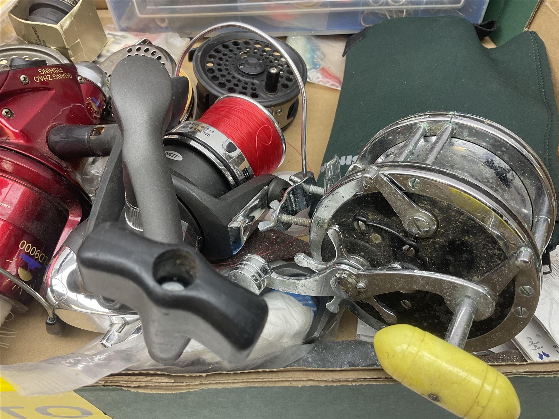 Quantity of fly and sea fishing rods and accessories, to include Shakespeare Boat 210 rod, Daiwa rod and others, and Guang Zhao FLD9000 course fishing reel, Beachmaster 7000FD, Rimfly II amd Penn Super Mariner, tackle etc