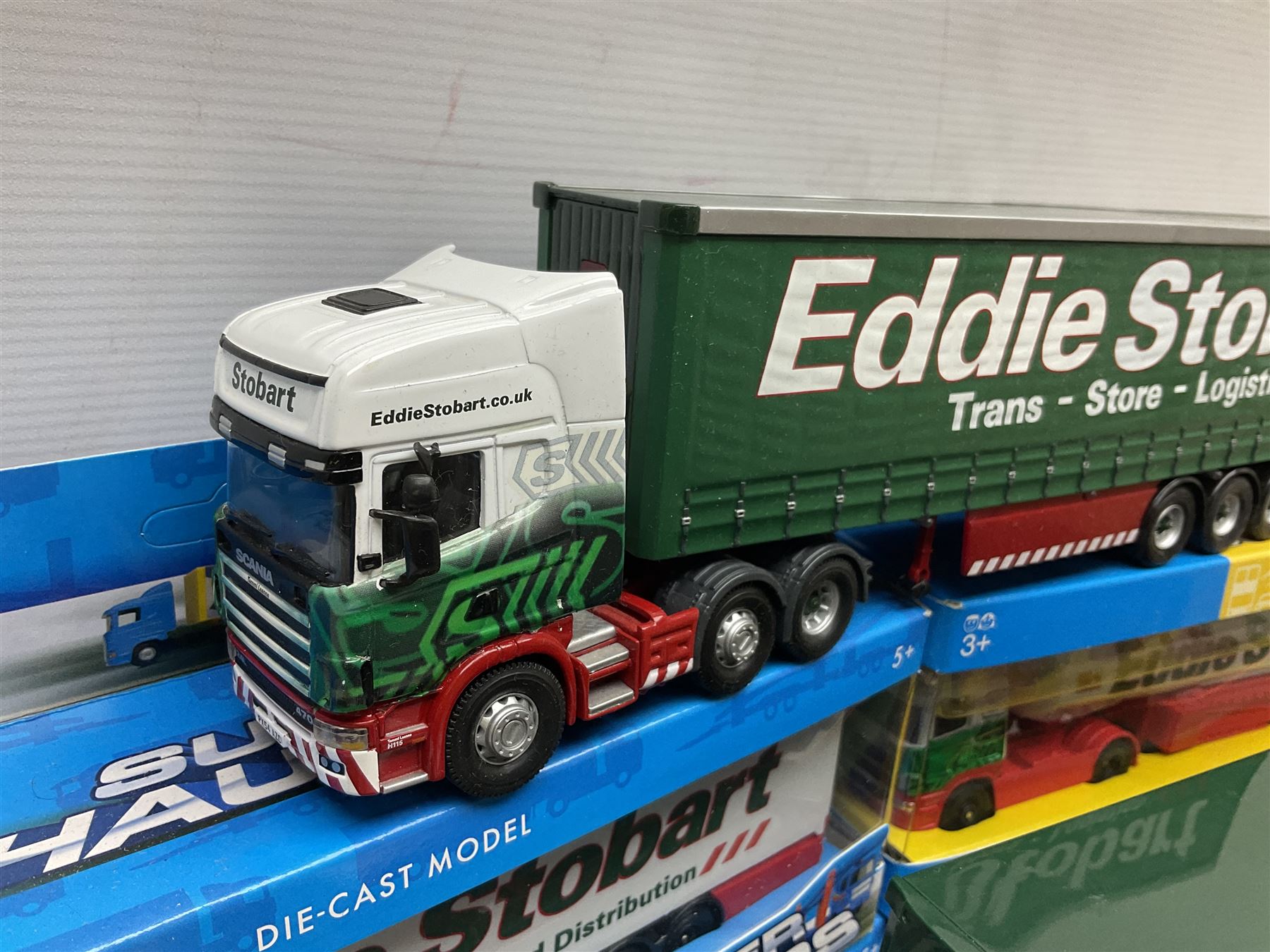 Corgi Eddie Stobart - four lorries in the Superhaulers Series Nos. TY86650, TY86649, TY86647 & TY86646; three other lorries Nos. 23203, 29103 & 20903; all boxed; and two unboxed lorries (9)