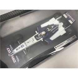 Five Mattel Hot Wheels 1:18 scale die-cast racing cars - Ferrari F1-2000 Michael Schumacher; Ferrari F-2002 Michael Schumacher; Jordan E-110 Heinz-Harald Frentzen; Williams F1 Team FW23Juan Pablo Montoya; and Ferrari F2001 Rubens Barrichello; all boxed (5)