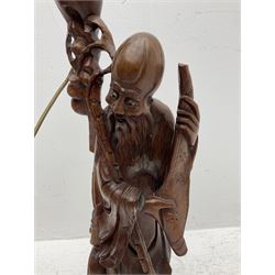 Carved hardwood table lamp modelled as a figure of an immortal, H66cm incl fitting