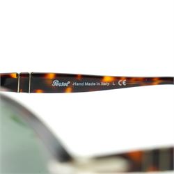Persol tortoiseshell acetate sunglasses, handmade in Italy, with dark green lenses, signature silver-tone arrow hinges and keyhole bridge, temple interiors stamped Persol and CE marks, together with original Persol case and cloth