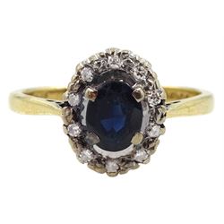 18ct gold oval sapphire and diamond cluster ring, hallmarked