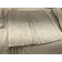 Large quantity of Victorian and later white linen items, to include bedcovers, table covers and clothes, tray cloths, cushion covers, including cutout work, crochet and lace edged, tatting, and embroidered examples.
