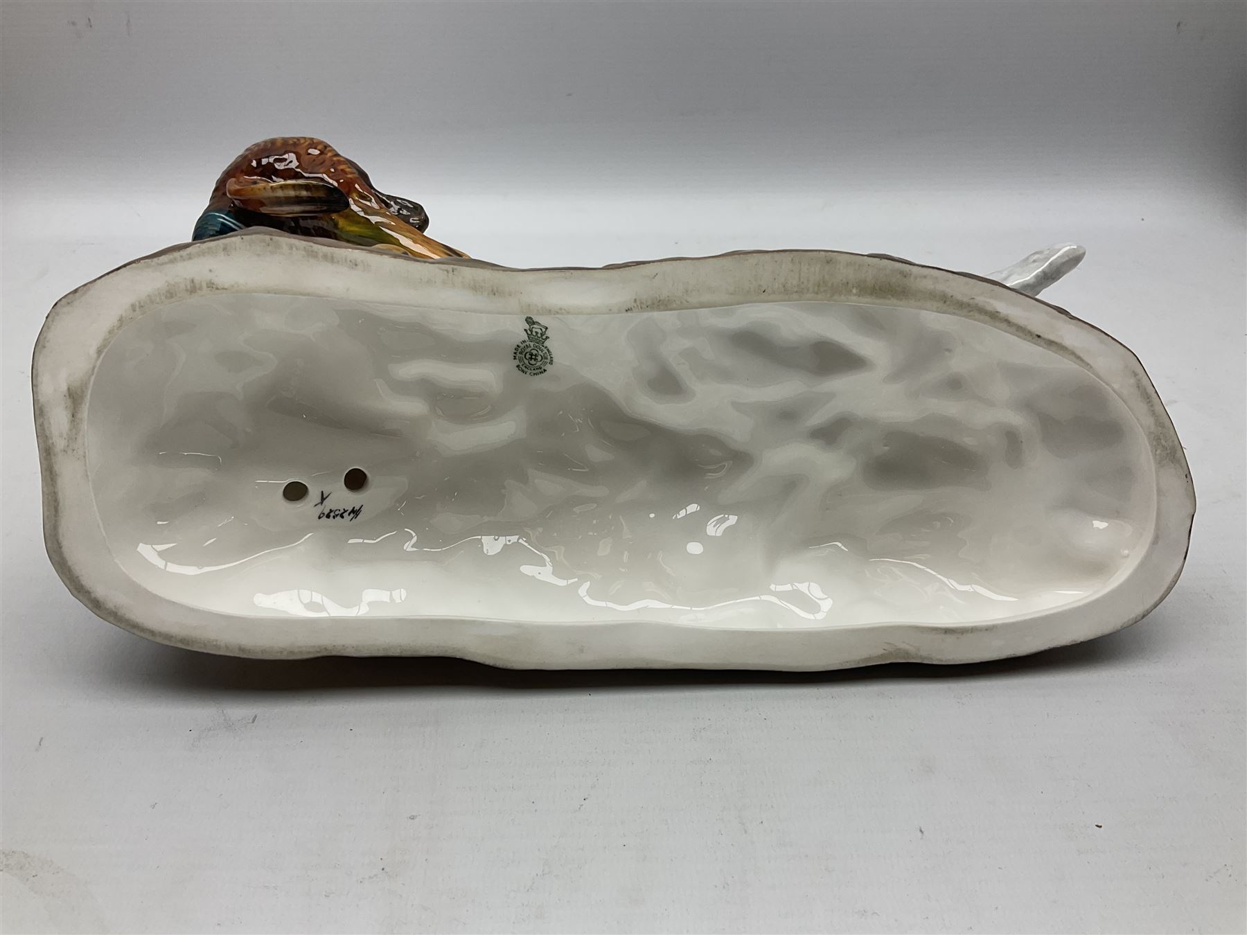 Royal Doulton model of an English setter carrying a pheasant, HN 2529, designed by Frederick Daws, H21cm