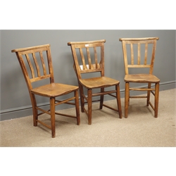  Set three early 20th century ash and elm chapel chairs with slat backs and turned supports  