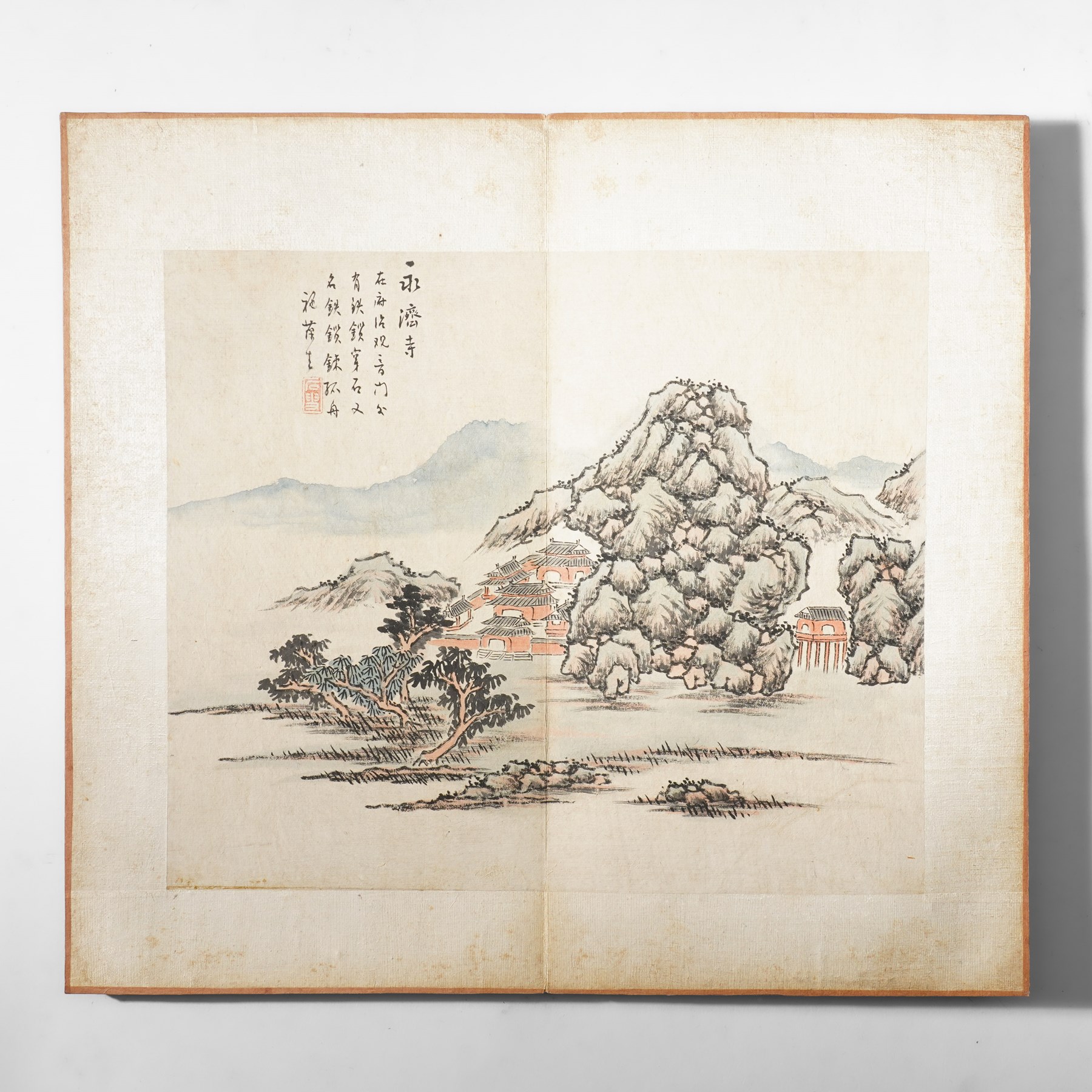 Chinese fold out book, comprising 12 hand-coloured woodblock landscapes each bearing inscription and artists seal  