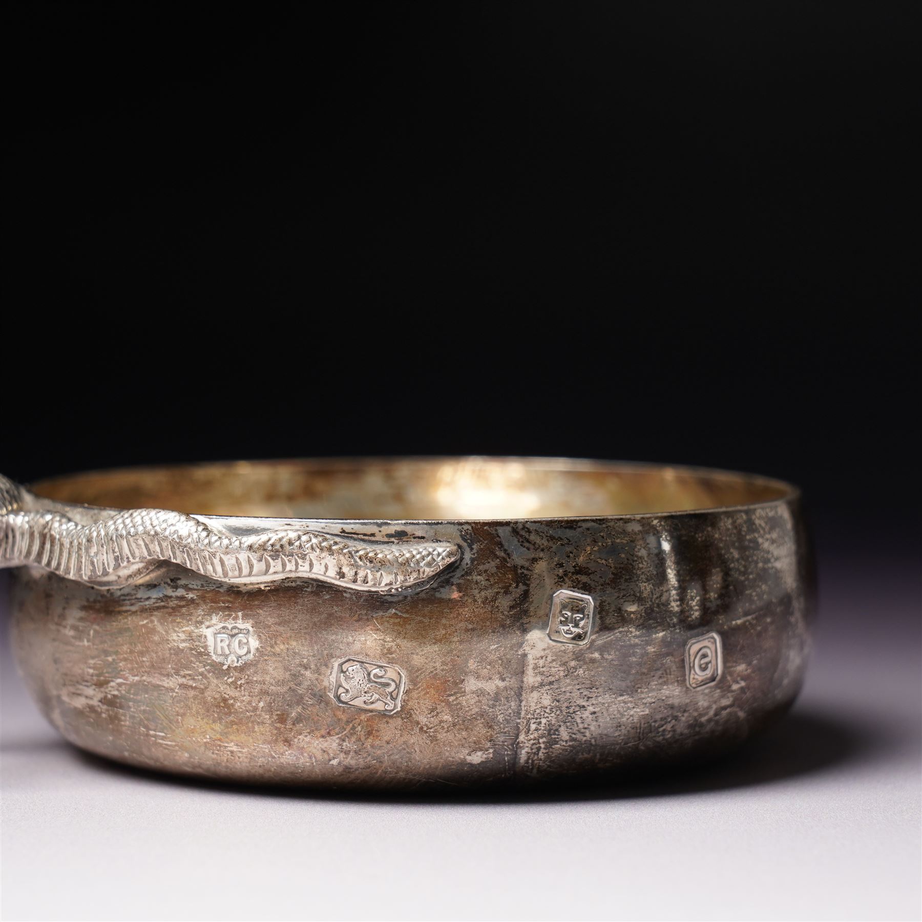 Elizabeth II silver tasse de vin with entwined snake handle London 1960 Maker William Comyns & Sons Ltd