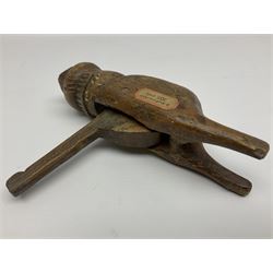 Rare primitive treen lever action nutcracker, probably late 17th/early 18th century, carved in the form of a man, with old collector label to side inscribed 'A Nutcracker XVI Century', H18cm