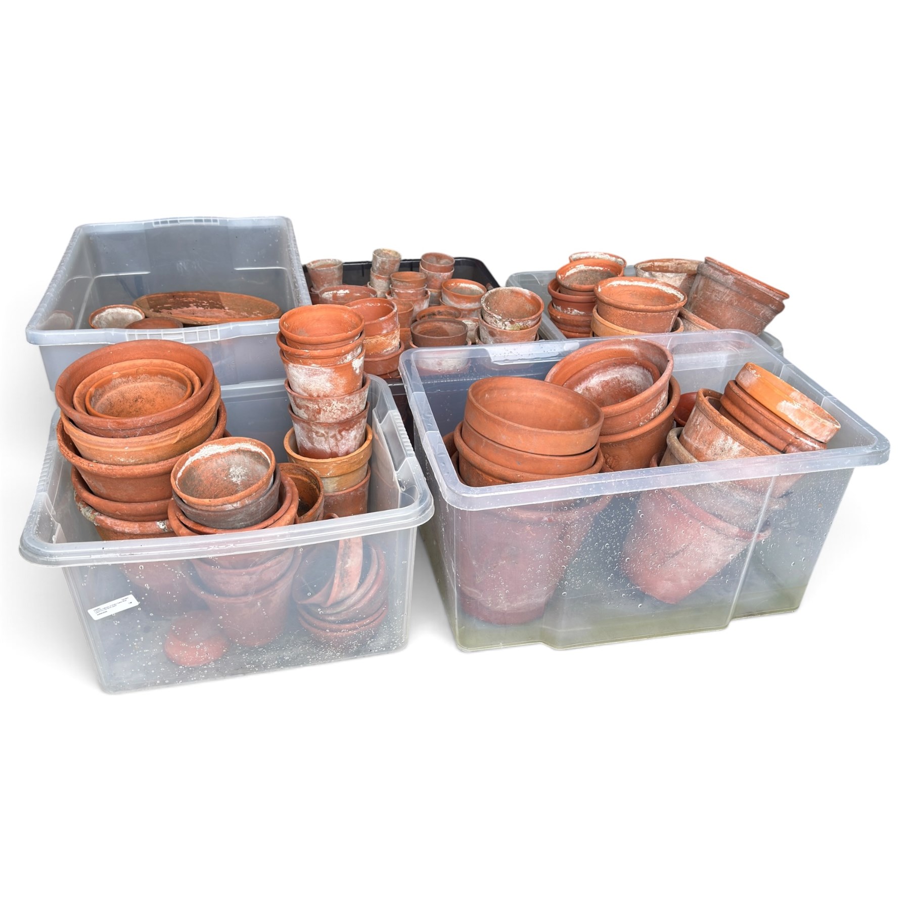 Large collection of vintage terracotta flowerpots of varying traditional forms and graduated sizes, including examples stamped Sankey’s Ltd, Bulwell, Notts and Hidcote, in five boxes